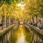 Amsterdam canal with bikes, bikes and more bikes